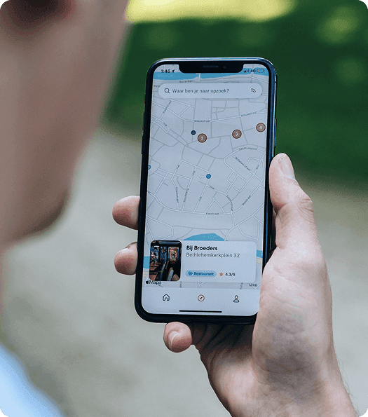 A man checking the location of a service on his phone